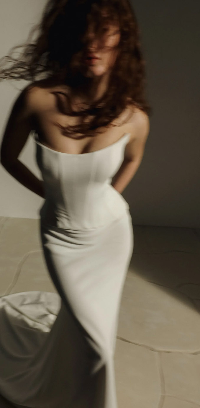 Photo of the model wearing a white gown #2