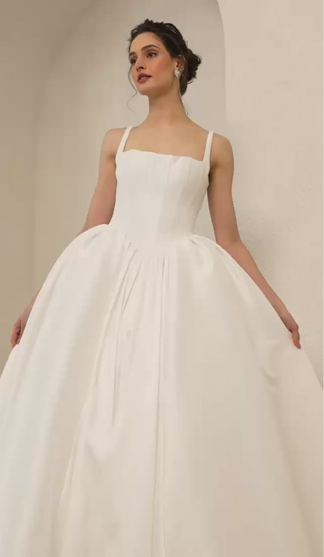 Model wearing a ball gown